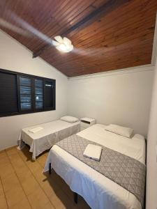 Giường trong phòng chung tại Eco Ville Vip Residence