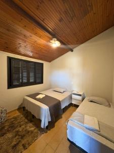 Giường trong phòng chung tại Eco Ville Vip Residence