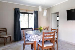 TV a/nebo společenská místnost v ubytování Ak´Para