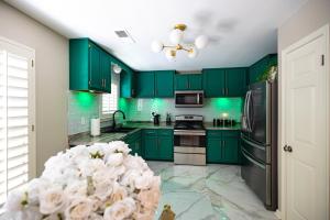 Køkken eller tekøkken på Cori's Pool House