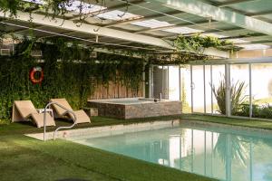 Bazén v ubytování Ak´Para nebo v jeho okolí