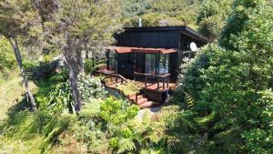 Κήπος έξω από το Golden Bay Heights - Luxury Accommodation