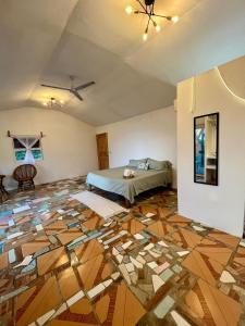 En eller flere senge i et værelse på Cabaña Punta del Cielo