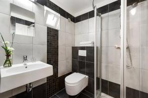 Koupelna v ubytování Hotel Rakovec