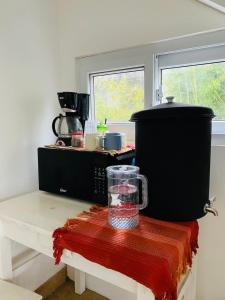 Casa Gema في سان خوان لاجونا: مطبخ مع طاولة عليها خلاط