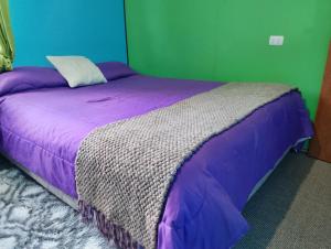 Ένα ή περισσότερα κρεβάτια σε δωμάτιο στο Agroturismo Silvestre Marly