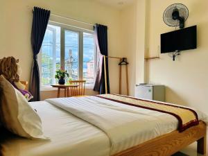 Postel nebo postele na pokoji v ubytování MiAn House