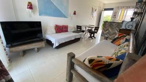 TV/trung tâm giải trí tại Apartamento Vista Mar até 4 hóspedes