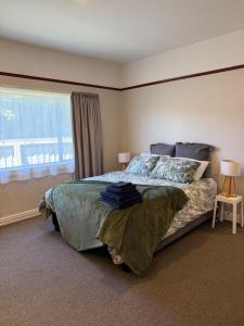 Кровать или кровати в номере Fendalton Ilam Getaway Convenience & Relaxation