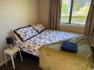 Кровать или кровати в номере Fendalton Ilam Getaway Convenience & Relaxation +13 фотографий