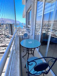 Un balcón o terraza en DEPARTAMENTOS en PLAYA CAVANCHA