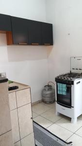 Η κουζίνα ή μικρή κουζίνα στο Casa aconchegante