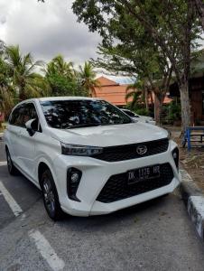 a white car parked in a parking lot at Ubud Classic Day Trip in Pesanggaran