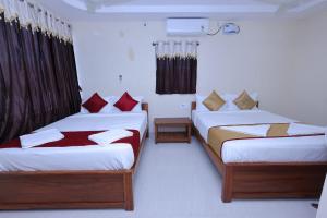 Postel nebo postele na pokoji v ubytování TEMPLEVIEW RESIDENCy + 9 fotografií