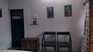 Postel nebo postele na pokoji v ubytování Swanky Sojourns Homestay