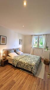 Postel nebo postele na pokoji v ubytování Yutz and Zen