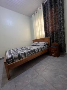 Postel nebo postele na pokoji v ubytování Backpackers Lodge