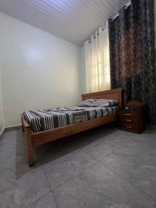 Postel nebo postele na pokoji v ubytování Backpackers Lodge