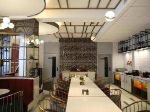 Εστιατόριο ή άλλο μέρος για φαγητό στο Magnotel Business Jining Huancheng North Road