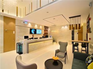 Μια τηλεόραση ή/και κέντρο ψυχαγωγίας στο City Comfort Inn Kunming High-speed Railway South Station 7th Street Area