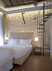 A bed or beds in a room at Arcipelago 41