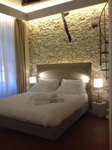A bed or beds in a room at Arcipelago 41