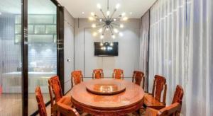 TV a/nebo společenská místnost v ubytování Echarm Hotel Torch Development Zone Zhongshan Station + 162 fotografií