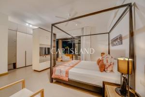 En eller flere senge i et værelse på Penthouse 3 chambres Vue Lagon imprenable