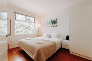 Postel nebo postele na pokoji v ubytování Beach Holiday Apartments