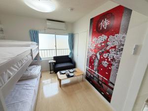 En eller flere senge i et værelse på ハイツ緑ヶ丘206