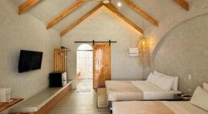 Postel nebo postele na pokoji v ubytování Santa Fe Beach Club