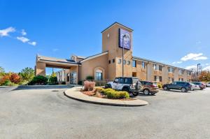 a parking lot in front of a hotel at Sleep Inn Beaver- Beckley in Beaver