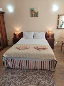 Postel nebo postele na pokoji v ubytování Studio Elegance Pamporovo