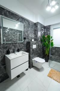 Ένα μπάνιο στο Yes, Sir!