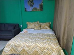 Ένα ή περισσότερα κρεβάτια σε δωμάτιο στο La Fortuna Brisas del Recuerdo +38 φωτογραφίες