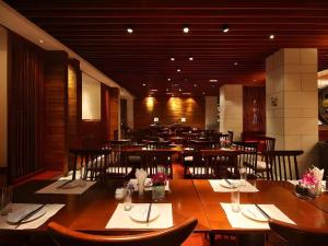 Un restaurante u otro lugar para comer en Man Wan Harmona Resort