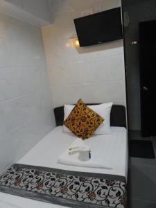 Llit o llits en una habitació de Paris Guest House (D2, 10/F)