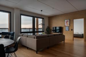 Μια τηλεόραση ή/και κέντρο ψυχαγωγίας στο Le Chalet Lingonberry D23 Ski-in Ski-out by Aavalevi