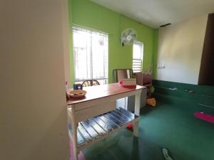 Χώρος καθιστικού στο SPOT ON 90119 Bed's Guesthouse +88 φωτογραφίες