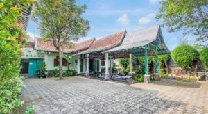 Κήπος έξω από το Capital O 93938 Wisma Pamungkas Syariah