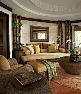 a living room with a couch and a table at Rayavadee - Terrace Pavilion in Railay Beach