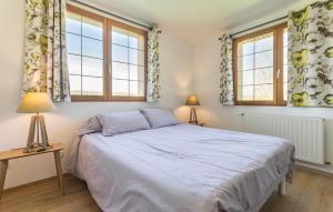 Postel nebo postele na pokoji v ubytování Amazing Home In Acquigny