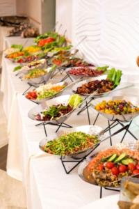 a buffet line with many plates of food at Aristocrat Hotel Haredi in Bnei Brak +12 photos