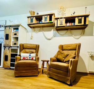 Η κουζίνα ή μικρή κουζίνα στο Lütte Wulke 8, wo Träume Weite finden +33 φωτογραφίες