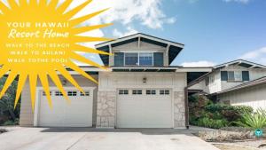 a house with a garage with a sign that reads your hawaiian resort home at Your Resort Home Walk to Disney & Beach in Honokai Hale +43 photos