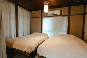 Φωτογραφία από το άλμπουμ του chidori4 伝統的な銭湯の上にある宿広々空間 銭湯無料体験 西九条駅 千鳥橋 USJ σε Wada