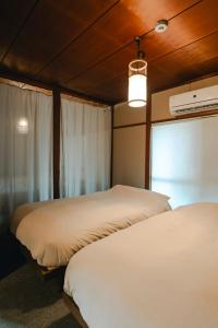 Φωτογραφία από το άλμπουμ του chidori4 伝統的な銭湯の上にある宿広々空間 銭湯無料体験 西九条駅 千鳥橋 USJ σε Wada