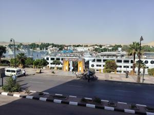 a view of a parking lot with a marina at Nile SE Felucca nile cruise private tour in Naj‘ al ‘Amrāb