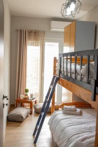 Una cama o camas en una habitación de XANTHI COUNTRY LAND apartment