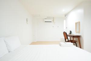 En eller flere senge i et værelse på XX Znap BTS Ekkamai Station - Bangkok